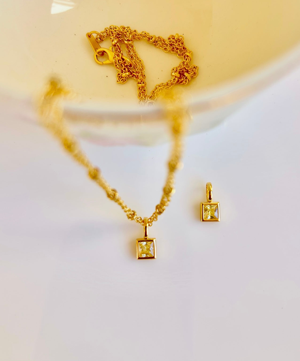 Gold November birthstone pendant necklace with citrine yellow gemstone