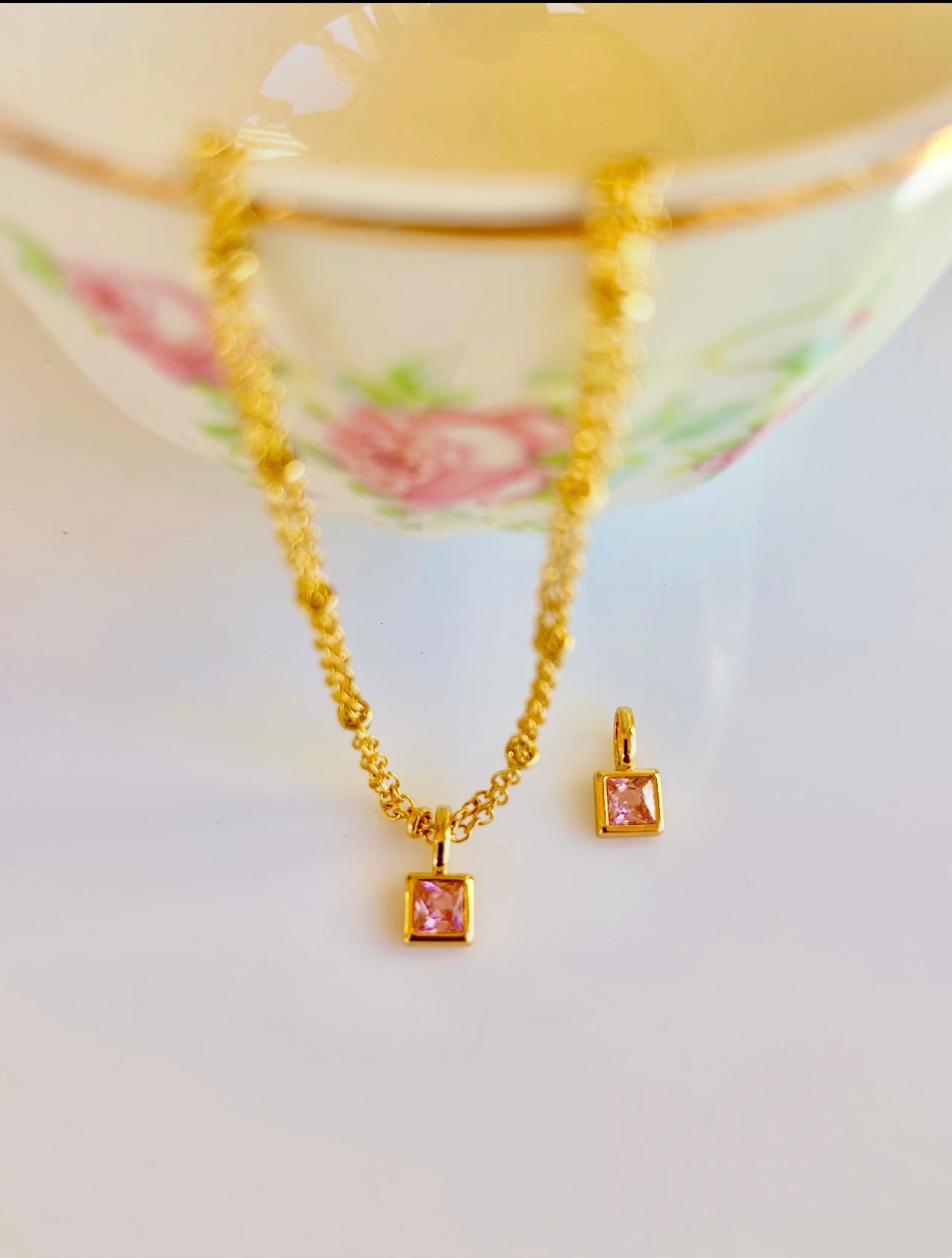 Gold October birthstone pendant necklace with pink tourmaline gemstone